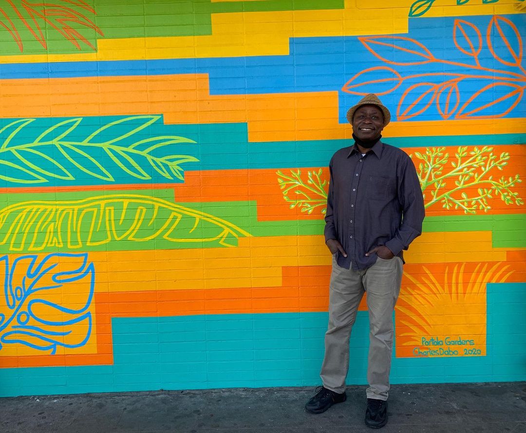 Charles Dabo in front of "Portola Gardens" | Photo: Portola Neighborhood Association
