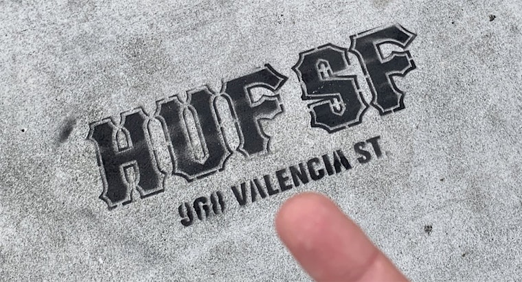 Mission District graffiti'd with skateboard brand's ads