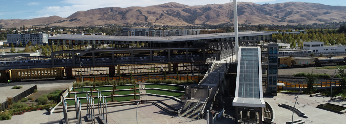 BART opens fancy pedestrian bridge over large swath of train tracks in Fremont