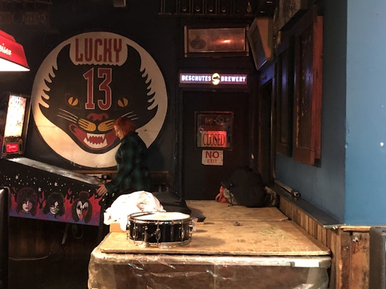 The Lucky 13 Sign has a new home, inside Bender’s Bar & Grill