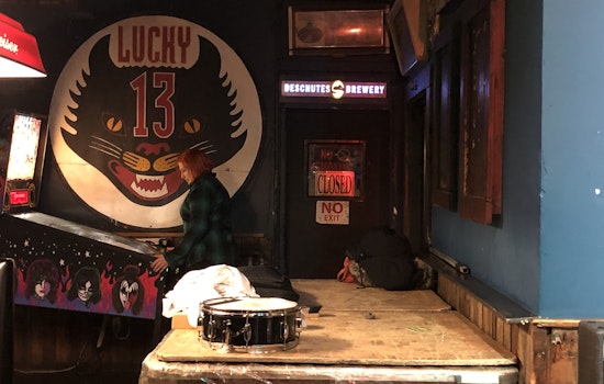 The Lucky 13 Sign has a new home, inside Bender’s Bar & Grill