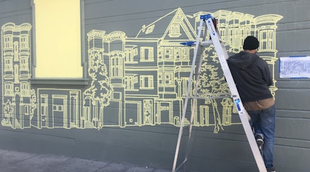 Burnt, charred Amos Goldbaum mural in Mission now being restored to full former glory