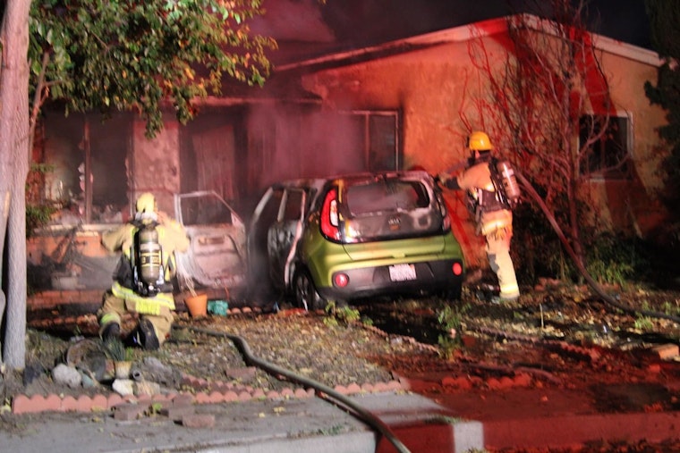 Vehicle Crashes Into Home Igniting Blaze in San Bernardino, Suspects on the Loose