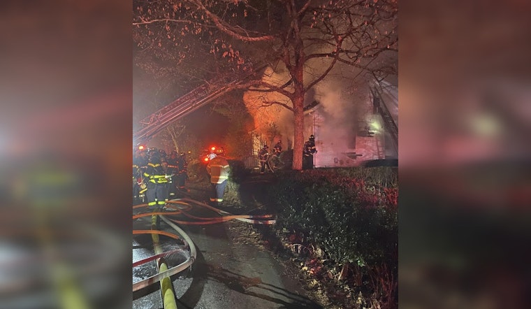 Firefighters Showcase Unwavering Resolve as Blaze Engulfs Wooden House in Westwood, Massachusetts