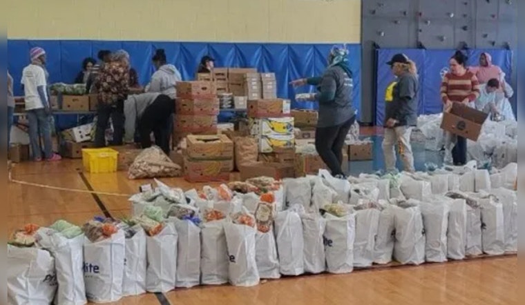 From Handcuffs to Handouts, Boston's Finest Trade Patrolling for Compassion in Community Food Drive