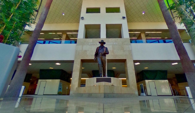 John Wayne Airport unveils an art exhibit titled "No Touching," offering a creative perspective on barriers driven by the pandemic.