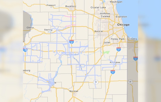 Winter Whips Through Windy City, Chicago Dons Not-So-Downy Coat of Snow as Illinois Braces for Icy Travels