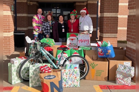 Austin Airport and Whiting-Turner Employees Bring Holiday Cheer to 14 Local Families in Need