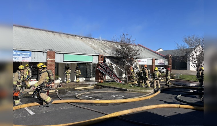 Austin Fire Department Battles Blaze at North Austin Strip Center, Urges Public to Avoid Area