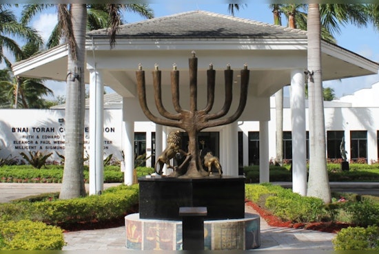 Boca Raton Synagogue Spreads Festive Cheer with Feast, Film, and Warmth for Over 225 Needy Souls