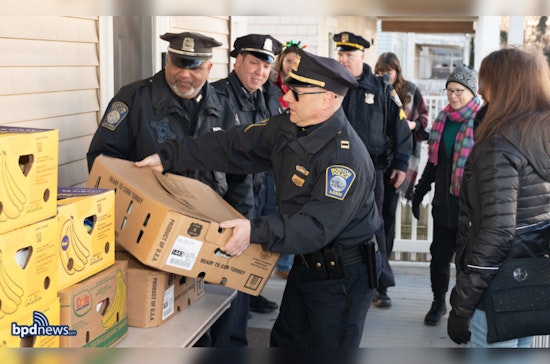 Boston Police Captain and Officers Partner with Local Businesses to Deliver Turkey Dinners to Families in Need