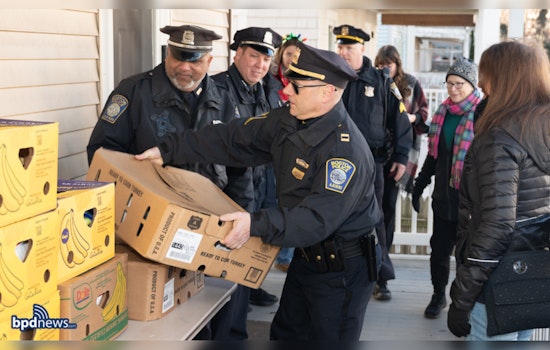 Boston Police Captain and Officers Partner with Local Businesses to Deliver Turkey Dinners to Families in Need