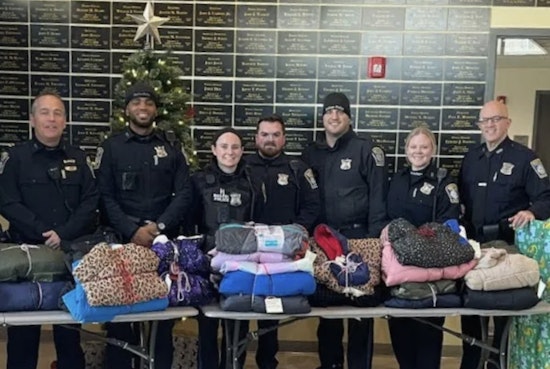 Boston Police Officers Team Up with Local Businesses for a Warm Coat Drive, Lifting Spirits in South End