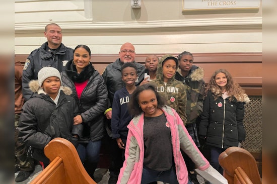 Boston Police Warm Hearts with Festive Cheer at Corey's Kids Christmas Event in South End