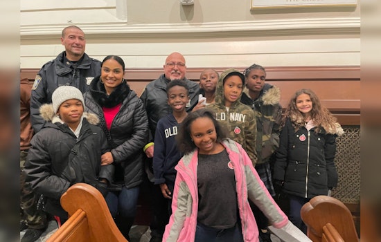 Boston Police Warm Hearts with Festive Cheer at Corey's Kids Christmas Event in South End