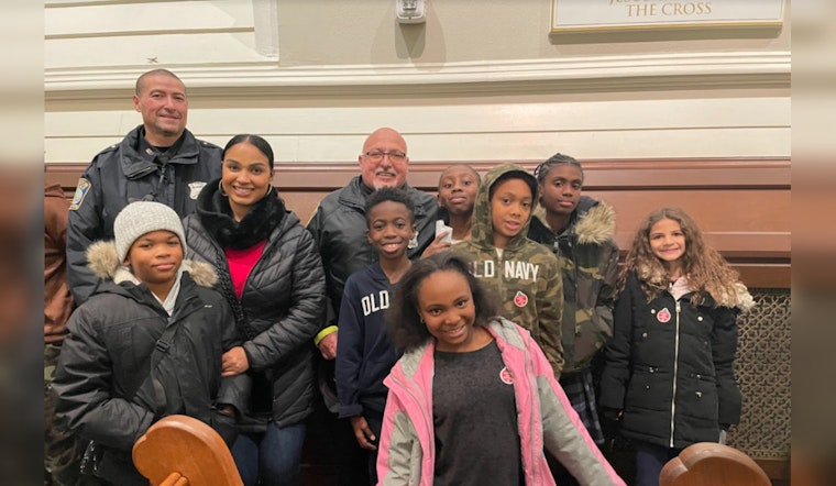 Boston Police Warm Hearts with Festive Cheer at Corey's Kids Christmas Event in South End