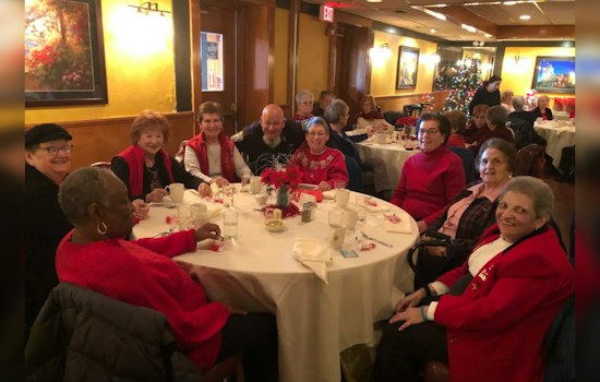 Boston's Finest Don Santa Caps as Boys in Blue Bring Holiday Cheer to Seniors