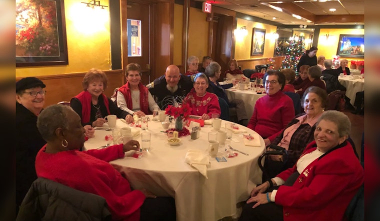 Boston's Finest Don Santa Caps as Boys in Blue Bring Holiday Cheer to Seniors