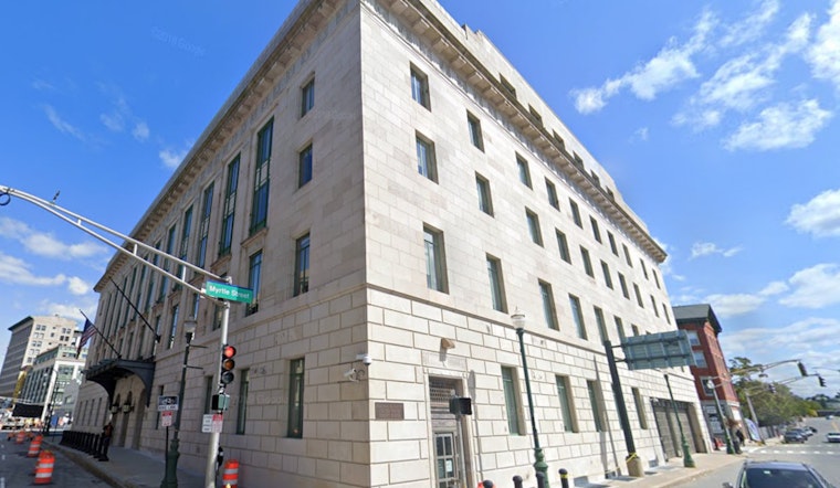 Dominican Drug Ring Dame Dinged with Decade in Boston Court