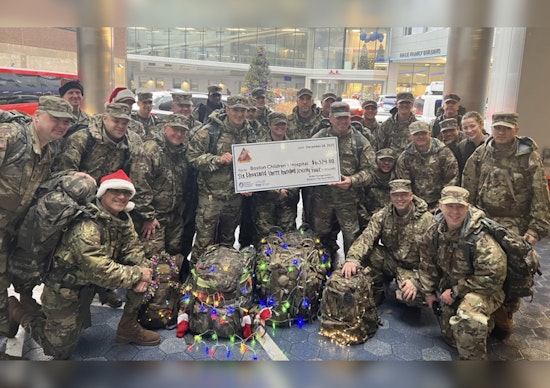March of Toys, Boston PD and National Guard Spread Holiday Joy to Hospitalized Kids