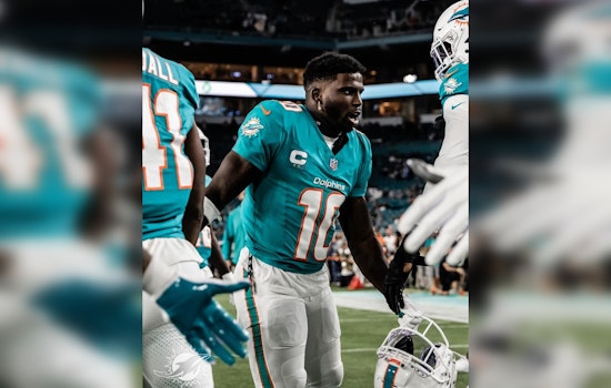 Miami Dolphins' Tyreek Hill Fires Back at Analyst Colin Cowherd's Playoffs Jab Amidst Strong Season