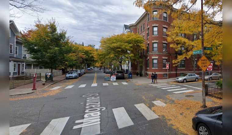 Young Woman Slain as Bullets Fly in Central Square
