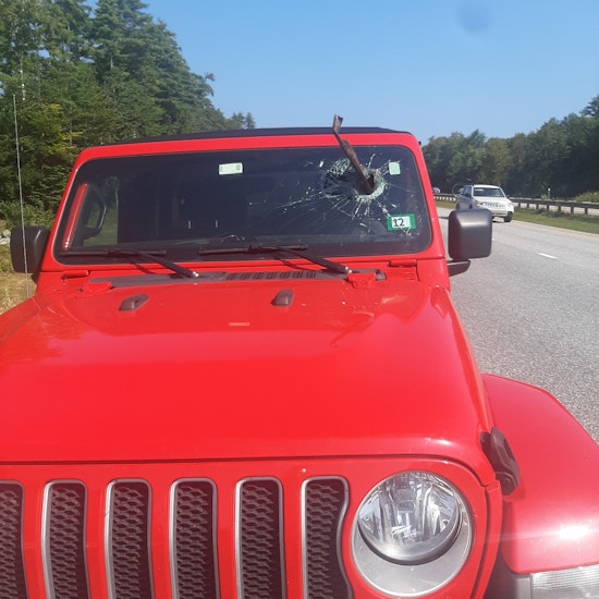 Frightening Near-Miss as Debris Shatters Windshield, Spares New Hampshire Driver on Maine Highway