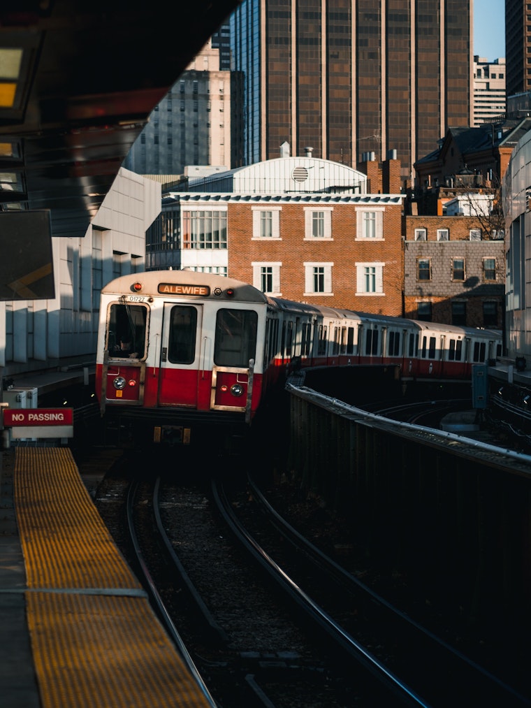 Red Line Train Barrels through Stop Signal, Narrowly Avoids Striking MBTA Workers