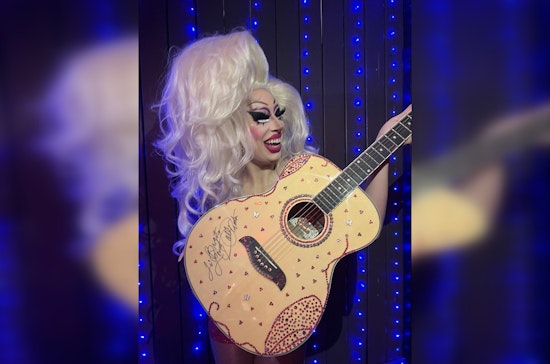 Austin's Drag Queen Brigitte Bandit Sparkles with Dolly Parton's Bejeweled Guitar Amid Anti-Drag Bill Battle