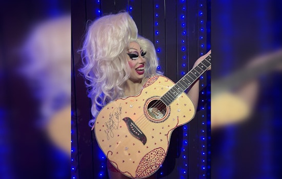 Austin's Drag Queen Brigitte Bandit Sparkles with Dolly Parton's Bejeweled Guitar Amid Anti-Drag Bill Battle