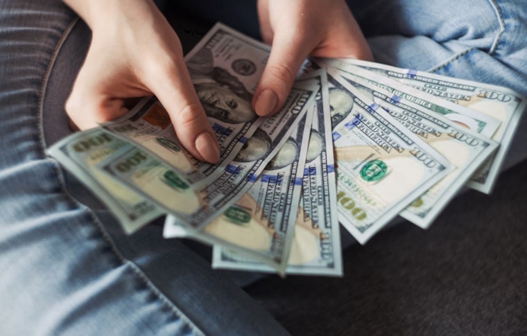 Austin's Guaranteed Income Pilot Aids Housing Stability, Faces Scrutiny from Texas Lawmakers