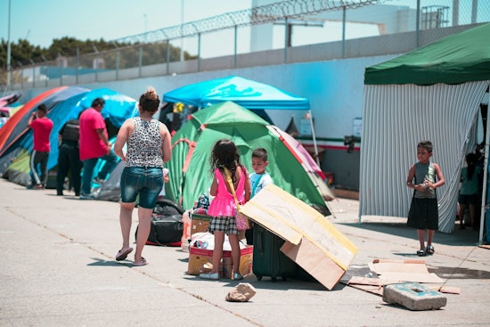 Chicago's Migrant Shelter Stalemate, Pritzker and Mayor Johnson Clash Amid Continuing Influx