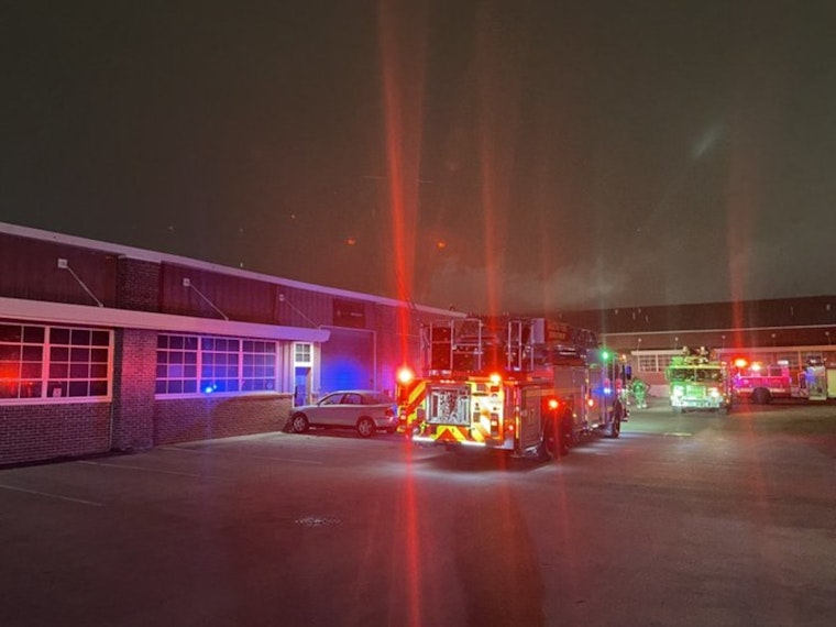 Firefighters Quell Trash Fire Spread to Commercial Building in South Austin