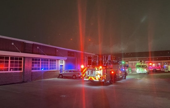 Firefighters Quell Trash Fire Spread to Commercial Building in South Austin