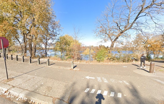 Minneapolis Community Shaken as Body Found Encased in Ice Between City Lakes