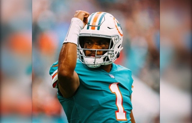 Miami's Tua Tagovailoa Braces for Chilly Playoff Debut Against Chiefs Without the Warmth of Gloves