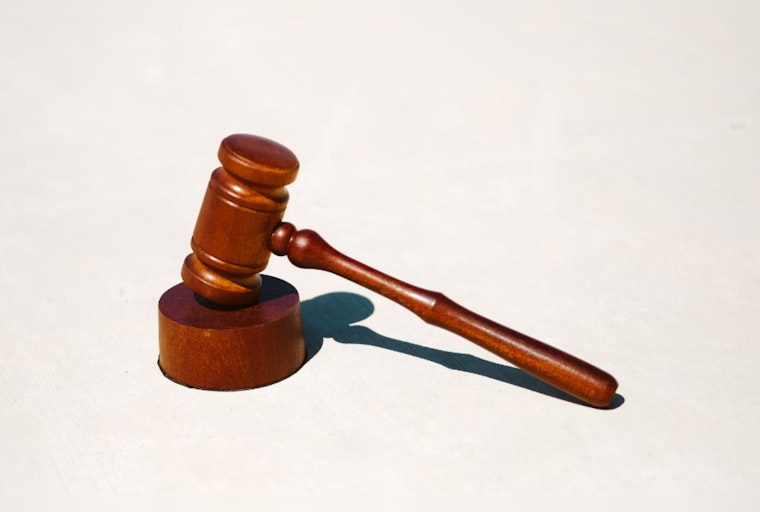 Michigan Financial Advisor Pleads Guilty to $260K Embezzlement Scheme