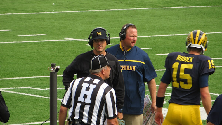 Michigan's Athletic Director Vows to Seal New Deal for Jim Harbaugh Amidst NFL Interest and Fan Pleas at Victory Parade in Ann Arbor