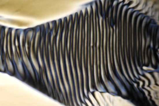 MIT Research Unveils Surprise Chirality in Flowing Liquid Crystals, Revolutionizing Material Design