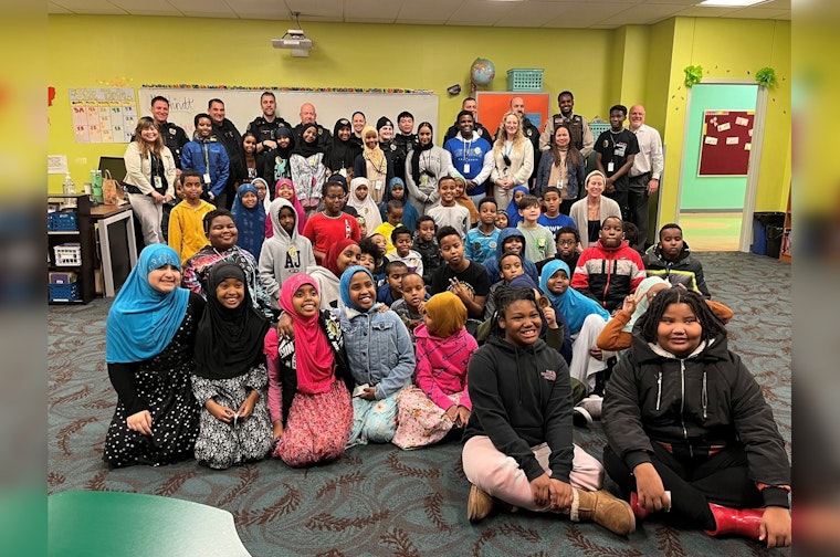 Saint Paul Police Sweeten Community Bonds with 'Cookies with a Cop' Event at Local Academy