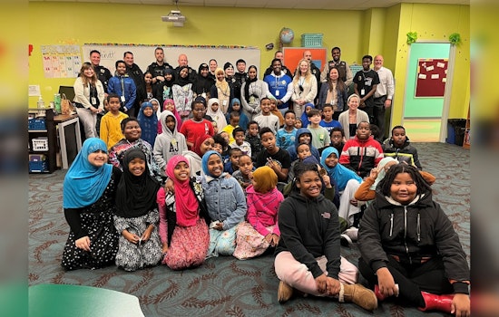 Saint Paul Police Sweeten Community Bonds with 'Cookies with a Cop' Event at Local Academy