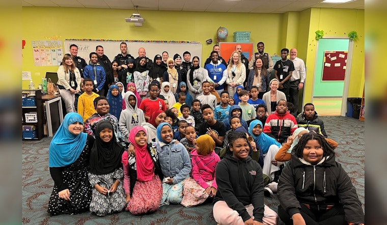 Saint Paul Police Sweeten Community Bonds with 'Cookies with a Cop' Event at Local Academy