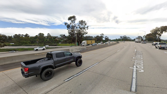 San Diego Firefighters Conduct Rescue Operation on I-805 Amidst Rainy Conditions