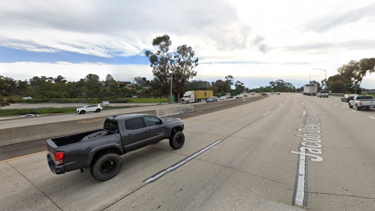 San Diego Firefighters Conduct Rescue Operation on I-805 Amidst Rainy Conditions