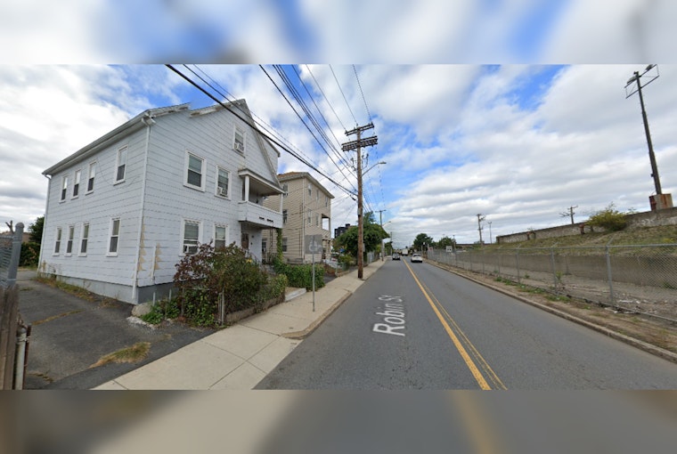 Several Families Displaced as Dump Truck Crashes into Home in Everett, No Residents Injured