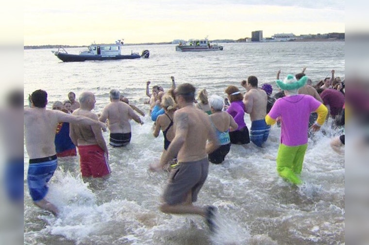 South Boston's L Street Brownies Dive into Charity with Annual Polar Plunge in Icy Dorchester Bay