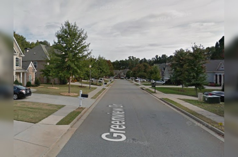 Three Suspects Charged After Daylight Drive-By Shooting Damages Homes in Newnan