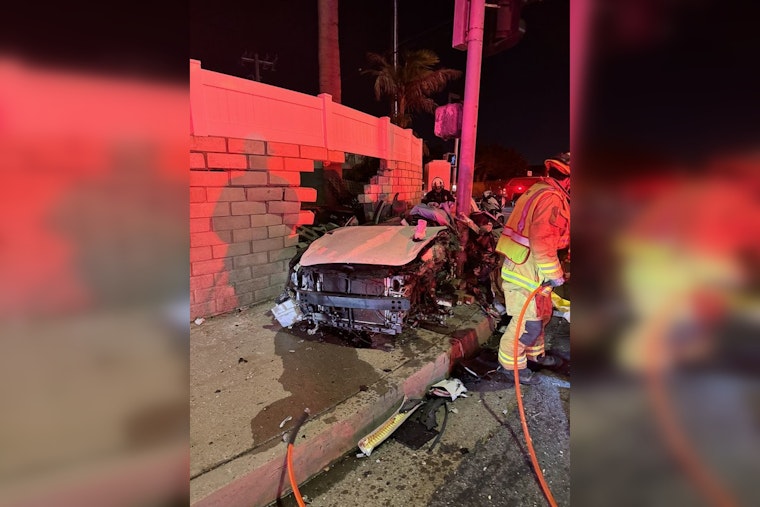 Two Trapped After Speeding Vehicle Strikes Light Pole in Huntington Beach Crash