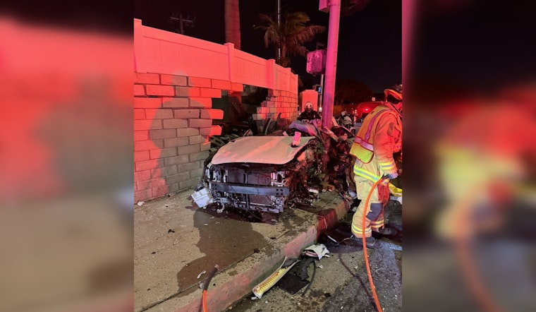 Two Trapped After Speeding Vehicle Strikes Light Pole in Huntington Beach Crash