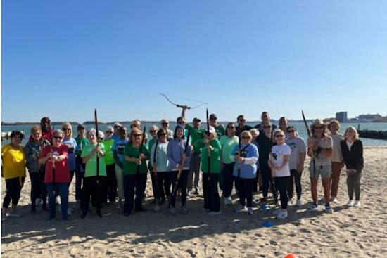 Boston Police and Charlestown Women Unite in Friendly Archery Competition to Foster Community Bonds